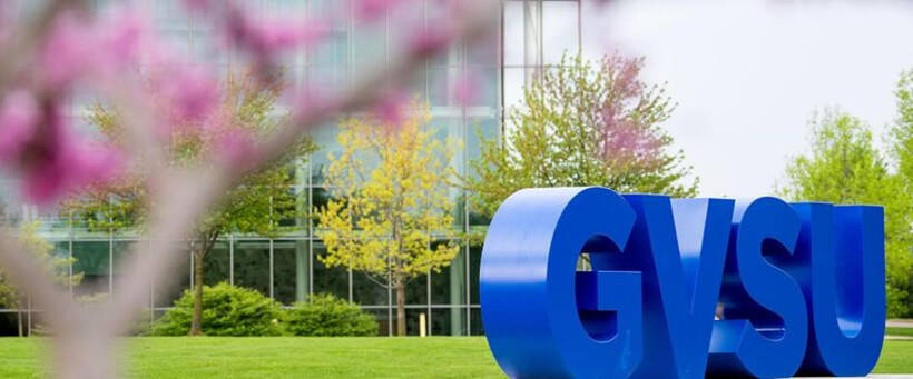 GVSU sign in courtyard near library